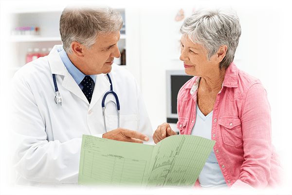 Doctor explaining treatment options to senior-aged patient